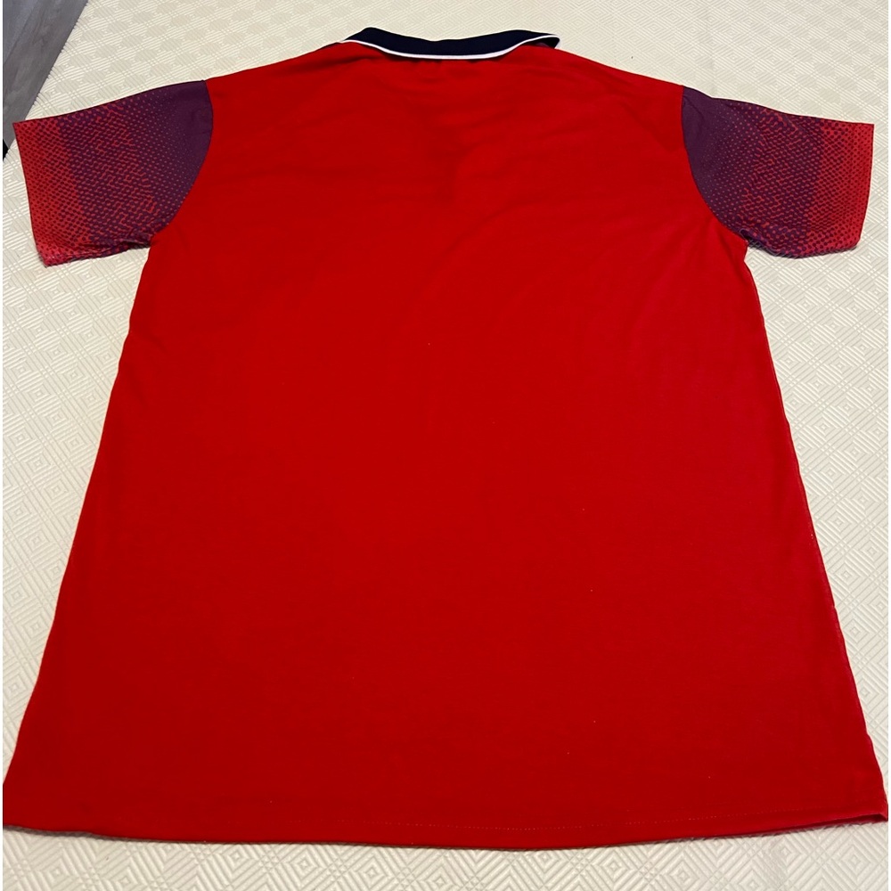 Selling one golf shirt bought online that fits a bit tight for my liking.